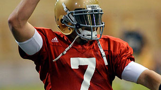 Cold-Cocked Clausen Coddled By QB Coaches